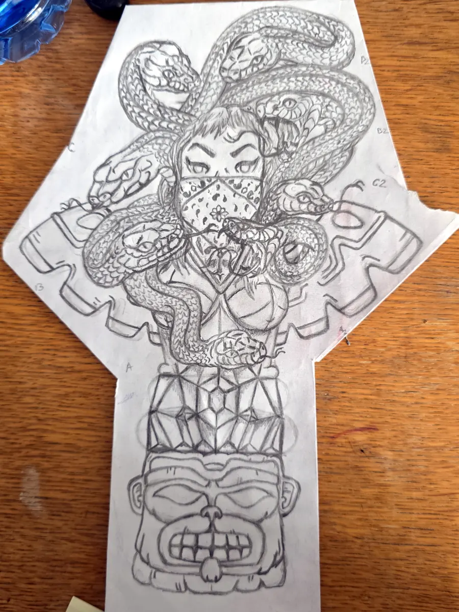 Detailed tattoo flash design on paper.