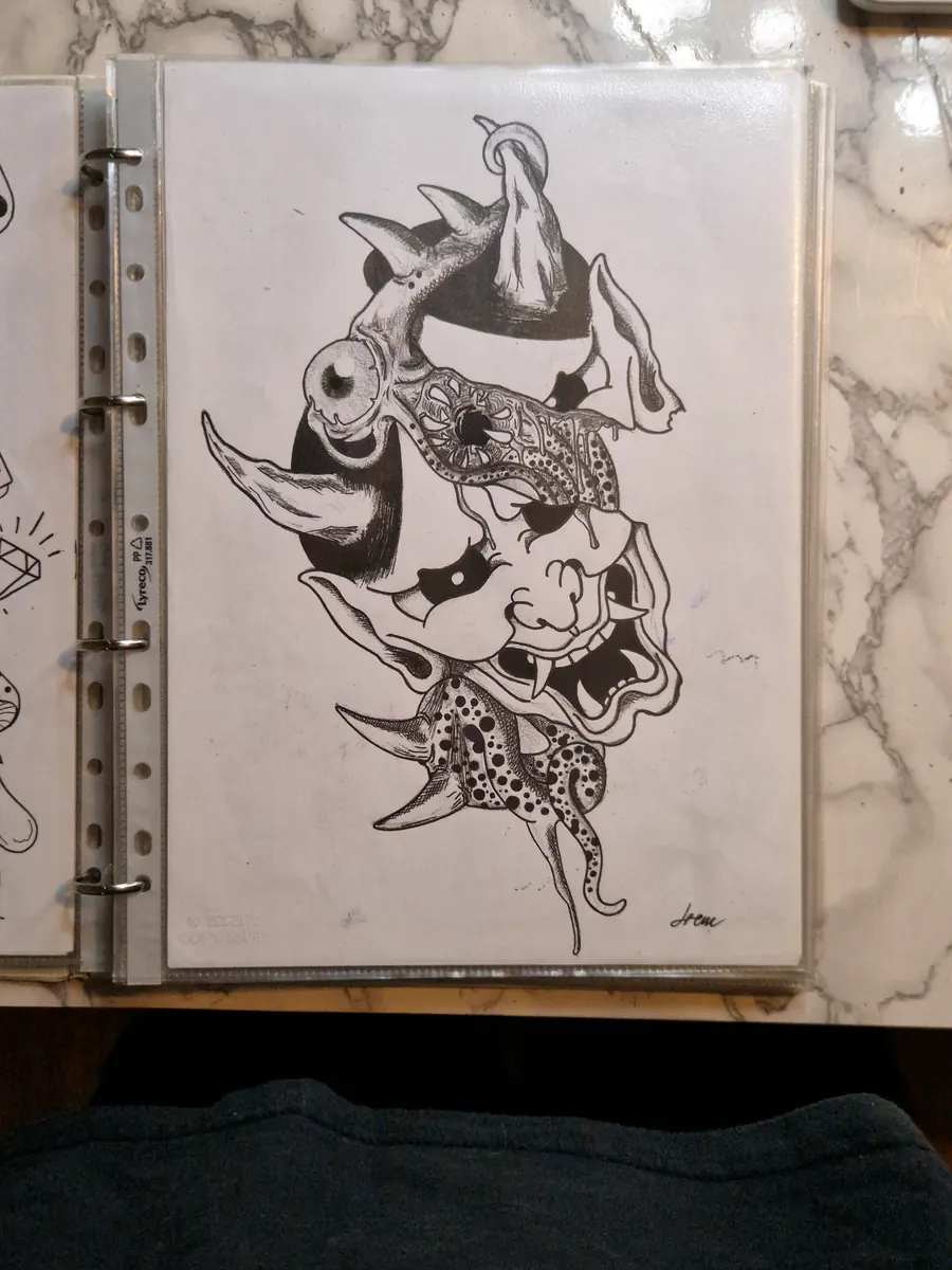 Panther tattoo design drawn on paper.